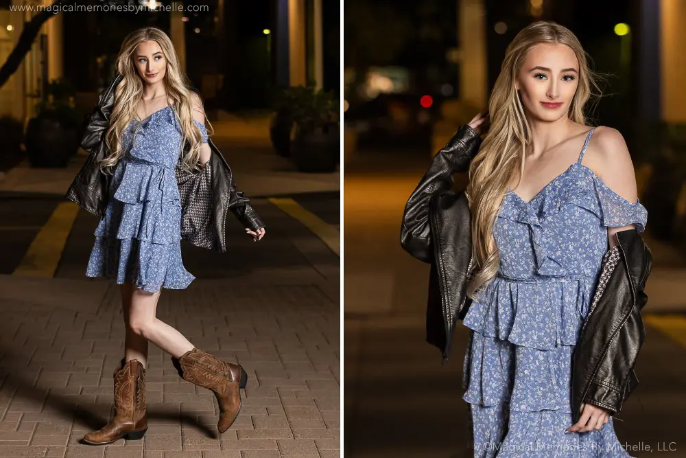 Senior girl wearing a ruffled blue dress and boots with a black leather jacket during nighttime senior pictures in Mesa.