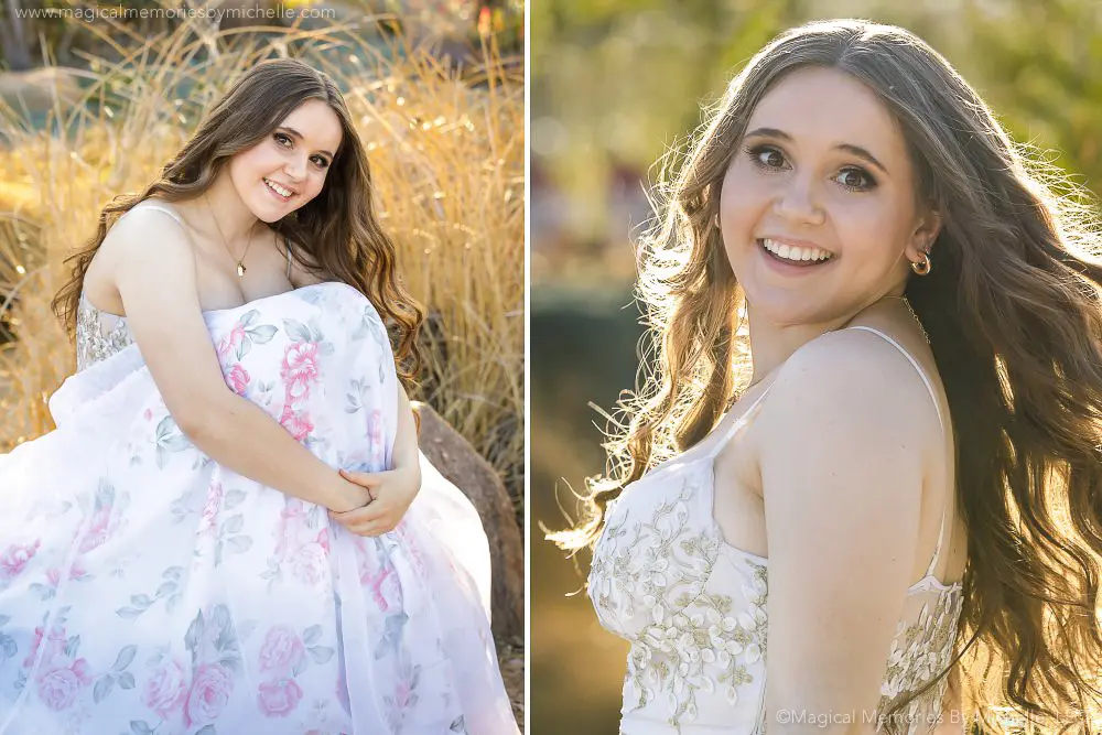 Senior girl in a light floral dress with sequins, posing naturally in a sunlit nature setting.