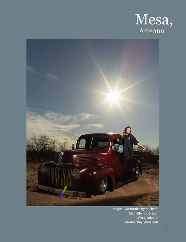 Teen girl standing in front of a vintage red truck with dramatic sunlight in Mesa, Arizona.