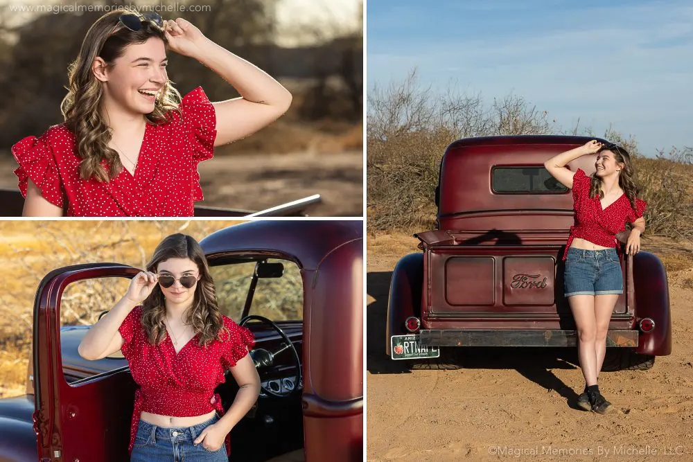 Senior girl in a red polka dot top and denim shorts posing with a vintage red truck in the desert.